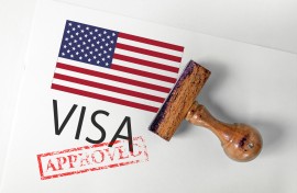 File: United States visa with flag. GettyImages/mirsad sarajlic