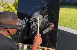 Sandile Kgaphola also known as SK Original with his art piece of Presley Chweneyagae.