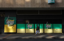 A man walks past Chief Albert Luthuli House, ANC headquarters in Johannesburg. AFP/Phill Magakoe