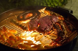 Boerewors and meat on braai stand