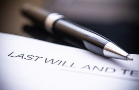 A close-up view of a last will and testament document. GettyImages/MoleQL