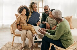 mixed family looking at documents