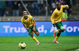 Oswin Appollis and Evidence Makgopa celebrating a goal for Bafana Bafana against Rwanda. 