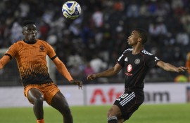 Sihle Nduli of Orlando Pirates challenges Rodney Maphangule of Polokwane City. BackpagePix/Sydney Mahlangu