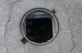 File: An open manhole. GettyImages/Jumbo2010