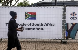 A banner featuring the South African flag and G20 logo at the Nasrec Expo Centre. AFP/Gianluigi Guercia