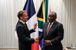 France’s President Emmanuel Macron (L) shakes hands with South Africa's President Cyril Ramaphosa (R) during their bilateral meeting at the Sandton Convention Centre in Sandton on November 21, 2025, ahead of the G20 leaders' Summit. 