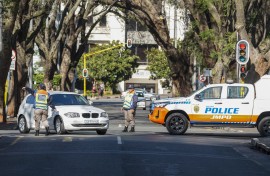 JMPD officers direct traffic on a road leading to the Nasrec Expo Centre. AFP/Zinyange Auntony