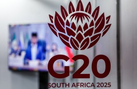 G20 logos are displayed at the media centre. AFP/Ludovic Marin