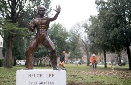 A restored statue honouring late martial arts legend Bruce Lee. AFP/Stringer