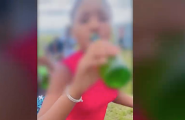 One of the children caught drinking.