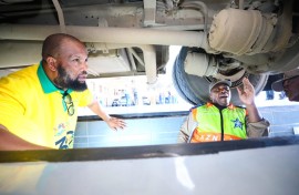 KwaZulu-Natal Department of Transport MEC Sibiniso Duma is seen during an inspection of the scholar transport services fleet.