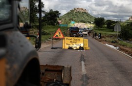 A sign indicating a closed road leading into Phalaborwa following heavy rains over much of Limpopo. AFP/Paul Botes