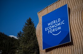 a sign displayed by the World Economic Forum (WEF) on the eve of the WEF annual meeting in Davos. AFP/Fabrice Coffrini