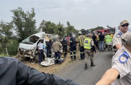 Rescue workers and South African Police Service (SAPS) forensic team members at the scene of the Vaal scholar transport accident. AFP/John Mkhize
