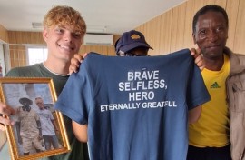James Smith working with volunteers to resuscitate the patient.