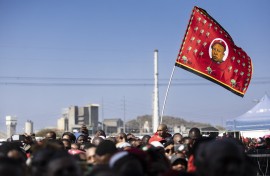 A flag with the image of Economic Freedom Fighters (EFF) leader Julius Malema. AFP/Guillem Sartorio