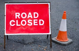 File: Road closed sign with traffic cone. GettyImages/ajfletch