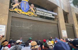 Parents protested outside the Gauteng Premier's office over the scholar transport strike. eNCA/Naomi Kobbie