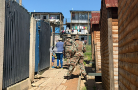 These were the scenes that played out on Wednesday as armed soldiers of the South African National Defence Force (SANDF) moved through homes in Westbury, west of Johannesburg. 