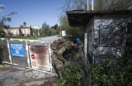 The gate to an entrance of the buffer zone separating the internationally recognized Republic of Cyprus and the breakaway Turkish Republic of Northern Cyprus — recognized only by Ankara — in the divided capital Nicosia. AFP/Jewel Samad