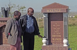 Family members of Griffiths Mxenge visit his, and his wife, Victoria's graves. Gallo Images/Oryx Media Archive
