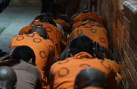 Officials pounce on inmates at St Albans Prison. Lulama Zenzile/Gallo Images