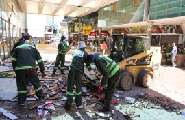 City Of Johannesburg officials work during a by-law enforcement operation to reclaim public spaces, restore law and order and remove illegal structures in the inner city. Gallo Images/Luba Lesolle