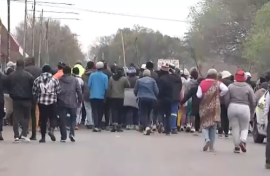 Angry protesters outside the business in Ekurhuleni. 