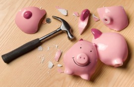 File: A smashed piggy bank. GettyImages/The Image Bank