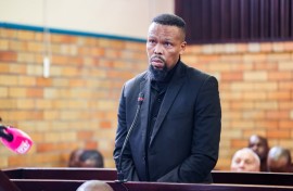Former SAPS Special Task Force member, Matipandile Sotheni, appears at Brakpan magistrate's court. Gallo Images/OJ Koloti