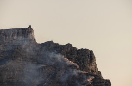 A fire rages on the side of Table Mountain in Cape Town. AFP/Gianluigi Guercia