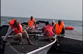 Passengers being rescued after a boat capsized on Zimbabwe’s Lake Kariba following an encounter with strong waves. AFP/UGC/Maxton Kanhema