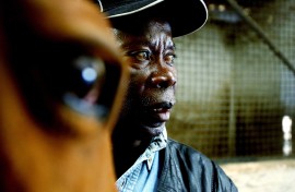 Enos Mafokate, the first black showjumper in South Africa, with one of his horses. Simphiwe Mbokazi/Gallo Images