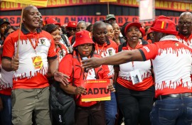 COSATU members celebrating during the day 2 of the COSATU 15th National Congress at Gallagher Convention Centre.  OJ Koloti/Gallo Images