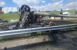 A male truck driver survived accident after the truck he was driving jack-knifed and caught fire. Photo supplied.