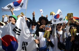 S. Korean pilgrims celebrate after the pope says Seoul will host the next World Youth Day