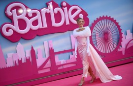 Australian actress Margot Robbie poses for a photo during the premier of "Barbie" in London