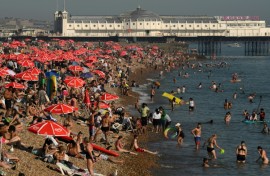 High September temperatures have seen Britons flock to beaches such as Brighton in southern England