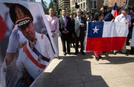 Supporters of Chilean dictator Augusto Pinochet demonstrate on the 30th anniversary of the plebiscite that ended his rule (1973-1990) in Santiago on October 5, 2018