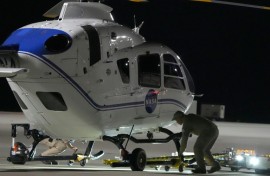 Crews prepare one of the helicopters that will participate in the Osiris-Rex asteroid sample return recovery mission in Dugway, Utah