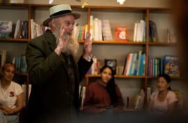 While on a week-long cruise vacation with his wife, Noll gave a talk to other passengers on the vessel in his Darwin garb, visited a school and the Charles Darwin Research Center where he did a presentation