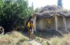 Ackov and his dog outside his home near Veles in North Macedonia 