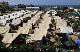 Tents for Palestinians seeking refuge are set up on the grounds of a UN Relief and Works Agency for Palestine Refugees centre in Khan Yunis in the southern Gaza Strip on October 19, 2023