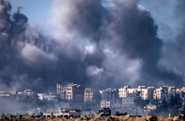 Somke rises over multiple targets in the Gaza Strip after an Israeli bombardment on Tuesday