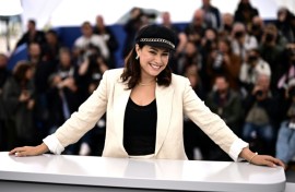 Tunisian actress Hend Sabri poses for photos at the 2023 Cannes Film Festival
