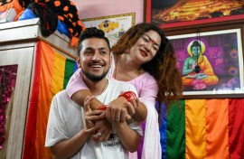 Maya Gurung (R) and Surendra Pandey held a Hindu marriage ceremony in 2017, and live together with their dog and cat