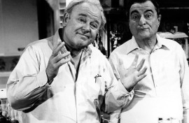 Actor Carroll O'Connor (L) portrayed bigoted patriarch Archie Bunker in the provocative TV series 'All In the Family,' for which Norman Lear made multiple pilots before the show was ultimately picked up by CBS in 1971 and became a prime-time smash