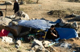 'A new normal': Migrants huddle in open-air camps on US border