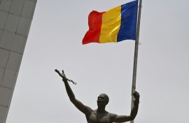In Chad's capital N'Djamena, the national flag flies on April 23, 2021, marking the state funeral for its late president Idriss Deby